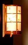 con sho sconce side view